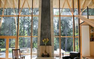 Windows surrounding unique fireplace